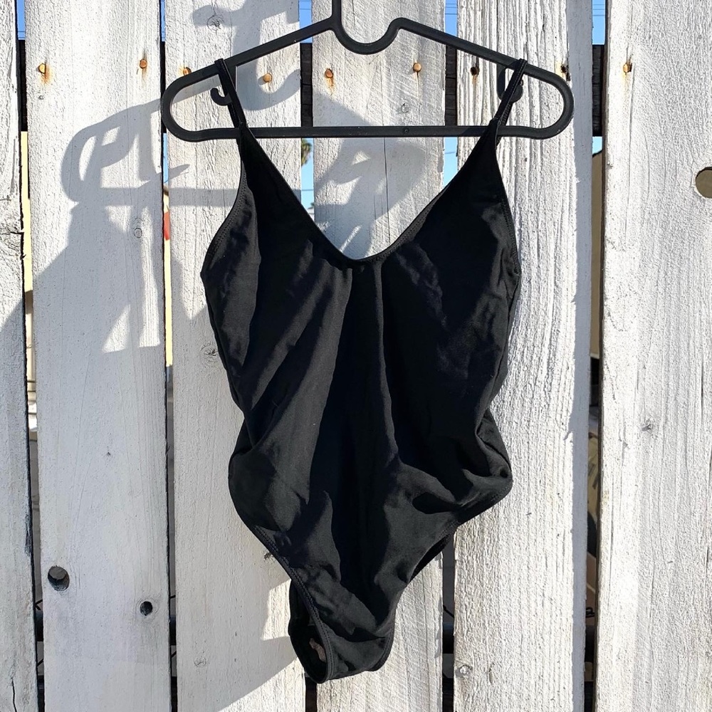 ASOS high leg black one piece swimsuit in a size 4
